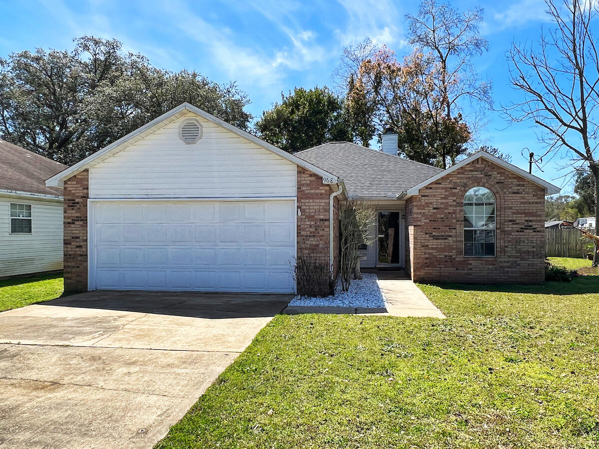 located just a few minutes from Hurlburt Fielld's back gate. convenient location n a neighborhood away from busy traffic, and close to shopping, this home has 3 bedrooms and 2 bathrooms. the living room has a fireplace with tray ceiling, double vanity in the master bathroom, fenced yard and covered patio in the back.