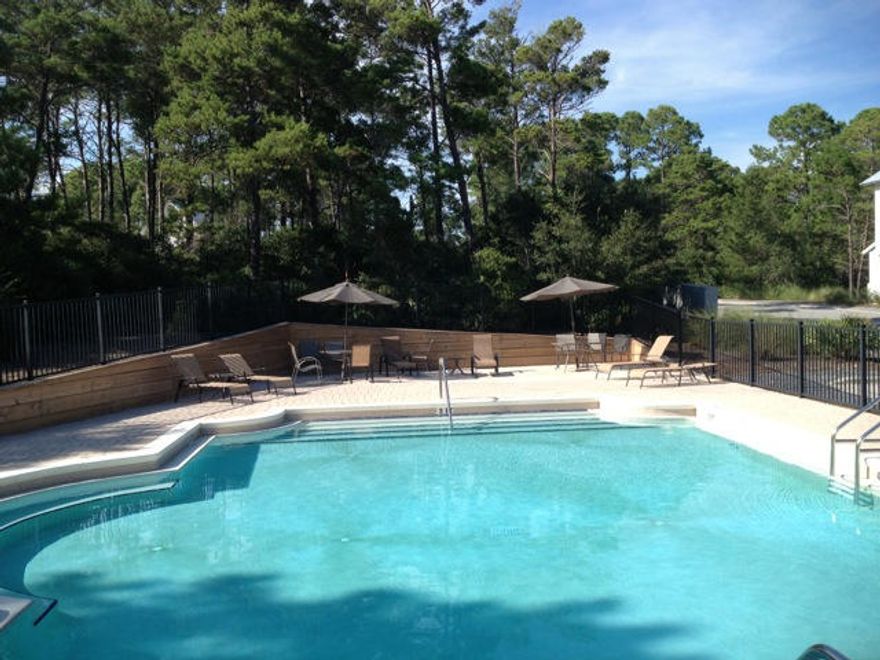 New price on a desirable homesite Blue Mountain, with easy access to beaches, schools, shopping and Sacred Heart Hospital! The north and east boundaries of this neighborhood, Lakeside at Blue Mountain, are a state park that includes Big Redfish Lake, one of the area's special coastal dune lakes. Lakeside at Blue Mountain is located just to the north of Redfish Village which has upscale dining, shops, and the beach access is at the end of Hwy. 30-A, an easy stroll away. Amenities include a beautiful pool and pretty clubhouse.