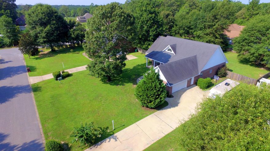 Stunning 4 bedroom 2 bath home located in the prestigious Dorchester subdivision in north Crestview. The home is on a half acre lot with a swimming pool and fully fenced in backyard. As you enter the home you will right away notice the beautiful engineered hard wood floors, open floorplan and upgrades galore. The kitchen was just recently remodeled with new wood cabinets, stainless steel appliances and gorgeous granite counter-tops. The master suite is located separate from the other rooms providing privacy and personal space. The master bath is equipped with separate shower and garden tub, dual vanity, and walk in closets. The other 3 bedrooms are all spacious and are perfect for kids, guest rooms or even using as an office. The screened in back porch is perfect for sitting on while watching the kids swim in your very own pool. The backyard also has a storage building for all your yard equipment and extra toys. Did I mention it has power? Schedule your showing today before its to late!!!