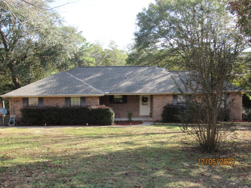 Back on the market because the buyer got cold feet! Lovely, 3-bedroom, 2 bath, all-brick home on a huge (1.61 acres) lot, in the highly coveted Grandview Heights community, conveniently located near schools, base, shopping, restaurants, and more. This home boasts a split floorplan, a spacious living room with fireplace, and double doors leading out to a huge back deck overlooking the wooded back yard complete with a little stream. The kitchen features black and stainless appliances, pantry, and there is a formal dining room. The large master bedroom easily accommodates king size furniture and has a huge walk-in closet and an en suite with a garden tub, walk-in shower, and double vanity. The two guest rooms share their own full bath, as well.