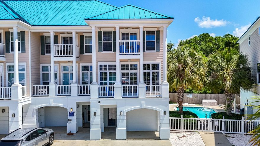Just one block from the sugar-white sands of Panama City Beach, this spacious three-story townhome offers an incredible opportunity for full-time living, a vacation retreat, or a high-performing investment. Located in the heart of the Long Beach community, this fully furnished end-unit features 5 bedrooms, 4.5 bathrooms, and nearly 2,400 square feet of coastal comfort. The versatile layout includes a private lockout suite on the first floor with its own entrance, kitchenette, full bath, and bunk beds--perfect for additional rental income or hosting guests. A private elevator provides easy access to all three levels, including the main floor where you'll find a bright and open living, dining, and kitchen area. The kitchen is a standout with bold cobalt blue cabinetry, granite countertops, stainless steel appliances, and a large island with bar seating. Just off the main living area is a guest bedroom with ensuite bath, as well as a covered balconyideal for sipping coffee while enjoying partial Gulf views and the breeze off the water. The top floor showcases an oversized primary suite with a private balcony, soaking tub, and tiled shower, along with two more bedrooms and an additional full bath. This unit is positioned in the building closest to the community pool, adding convenience for both owners and guests. Located just minutes from local favorites like Pineapple Willy's, The Wharf Buffet, and shopping at Pier Park, you'll also enjoy easy access to mini golf, arcades, and live entertainment. With the beach a short walk away and restaurants within walking distance, the location is ideal for making the most of everything PCB has to offer. Whether you're looking for a personal beach getaway or a turnkey rental-ready property, this townhouse checks all the boxes.
