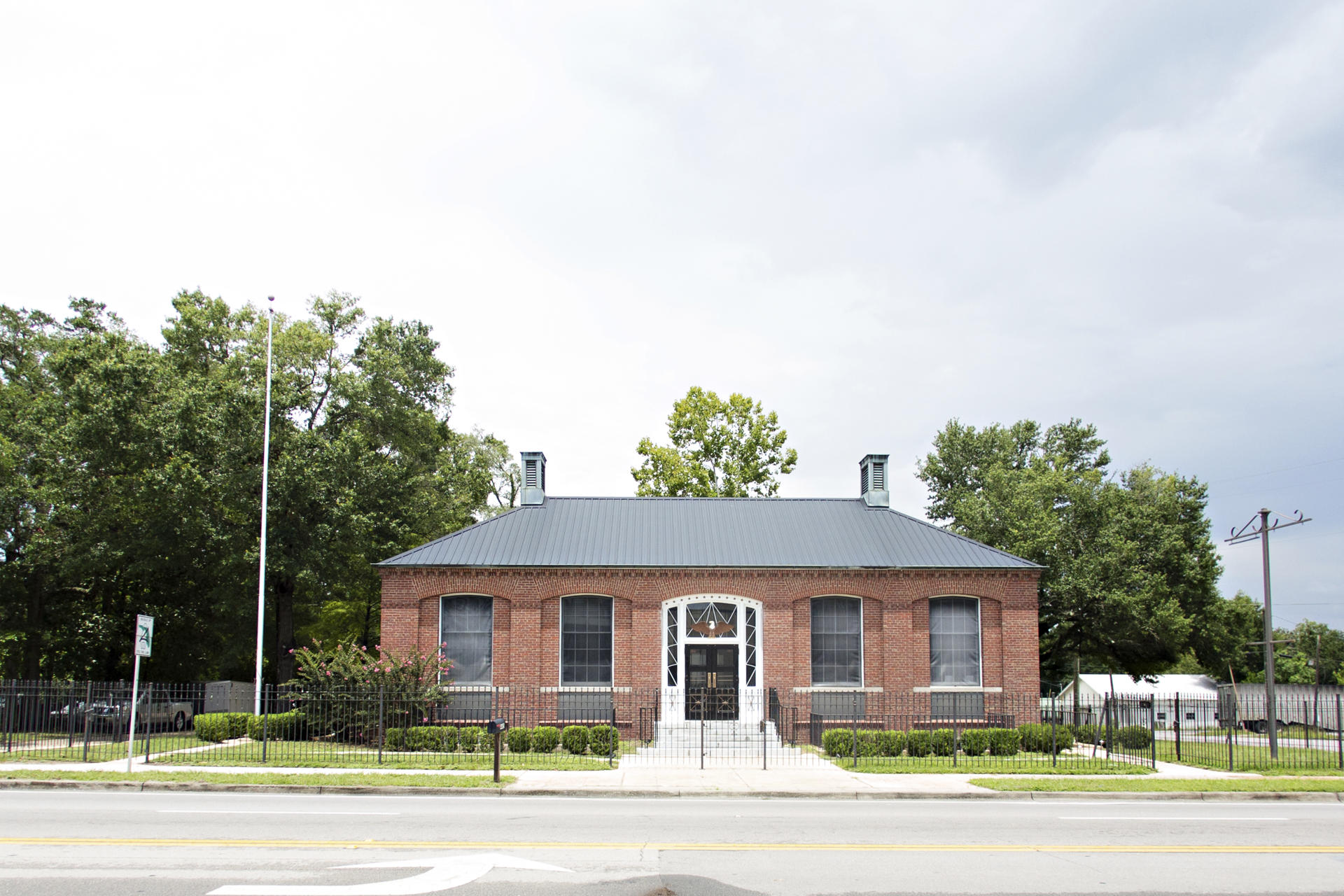 This is a unique opportunity to own commercial property in Historic Downtown Defuniak Springs. The Post is a village mixed-use building with approx 2,800sf of premiere fully renovated ground level office space with mixed use above. The ground level has two offices, one large executive office with ensuite conference area, board room and a large reception area. All rooms feature restored historic details. The Post was built in 1938 and served as the United States Post Office in DeFuniak Springs, FL for 50 years. Original main level details include terrazzo floors, marble wainscoting and Harold, a cast Bald Eagle who soars majestically above the main entrance. The Post is one block west of the Walton County Courthouse & a 30 minute commute from the beaches of South Walton.