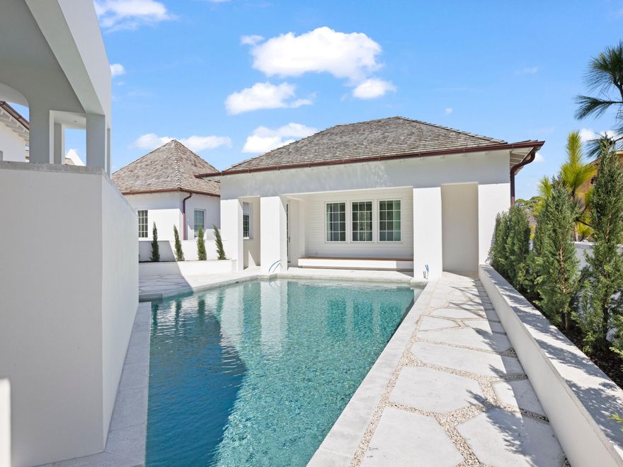 Welcome to Villa Maraya -- an architectural masterpiece by Khoury Vogt Architects, perfectly situated in the heart of Kaiya Beach Resort. This coastal-modern residence embodies symmetry, serenity, and intention in every detail.A sunlit gallery hall leads into an open-concept kitchen anchored by a sculptural marble island, fluted cabinetry, and a hidden butler's pantry -- all enhanced by Wolf appliances and sophisticated finishes. Retractable glass doors open to a floating second-story pool and expansive loggia, creating a seamless connection between indoor and outdoor living. The main home offers four generous bedroom suites and a media bunk room, complemented by a detached carriage house with private guest quarters. The primary suite serves as a true sanctuary, marked by soaring ceilings and spa-inspired details. Graceful arches, lime-washed walls, wide-plank oak floors, and carefully curated fixtures define the home's tranquil, minimalist aesthetic.

Encircled by lush gardens and nestled within the exclusive, amenity-rich Kaiya Beach Resort, Villa Maraya provides access to beach walkovers, a wellness center, concierge services, a resort-style pool, and thoughtfully designed gathering spaces  a complete expression of refined coastal living.