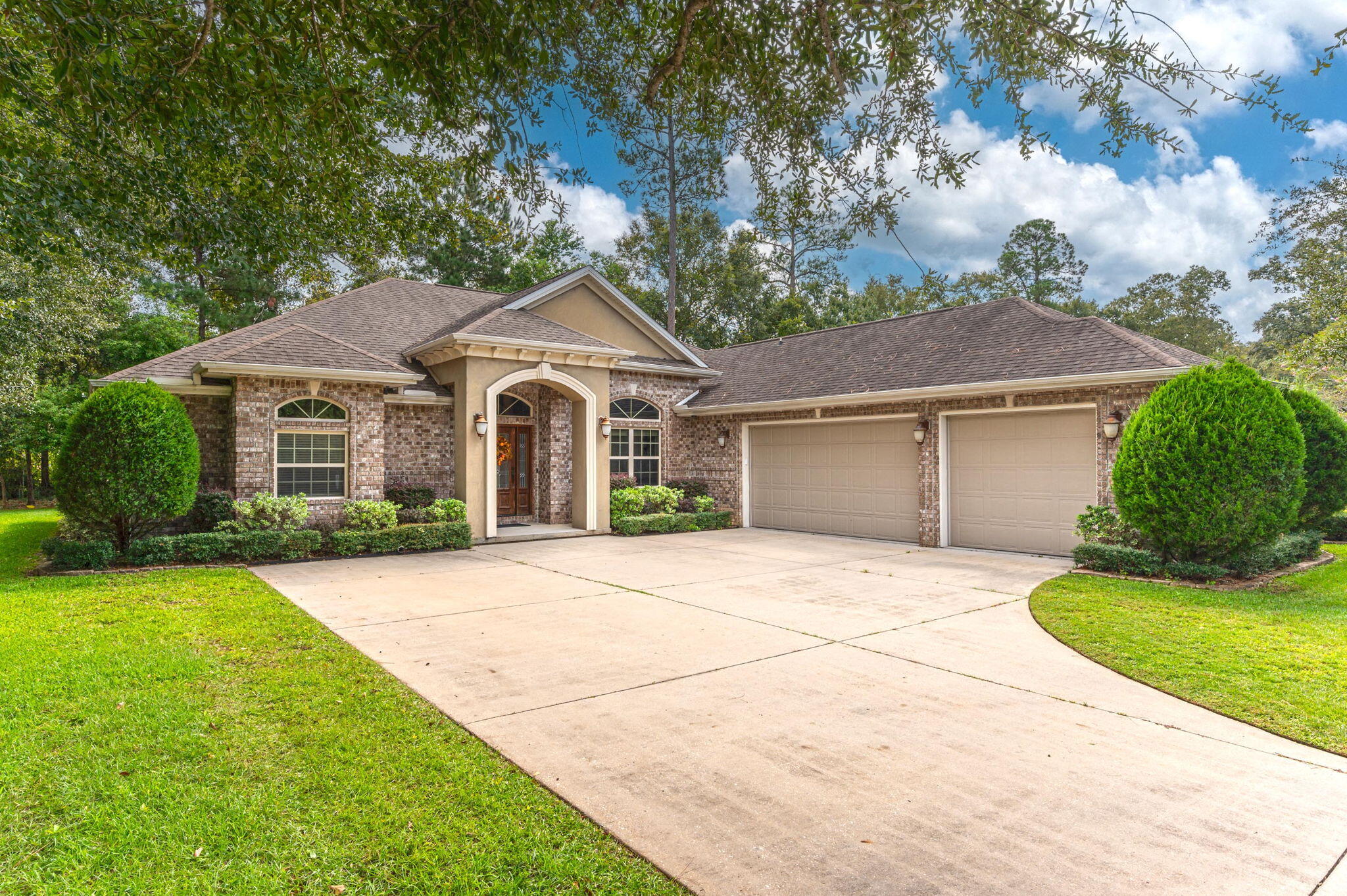 Price reduced and Seller is motivated to sell due to job relocation! This home was built with beautiful architectural detail. All brick exterior with some stucco style accents at the front elevation. Tinted windows on front of home. Beautiful solid door imported from Brazil welcomes you into the home with 11 ft ceilings in foyer.The home features a great floor plan with 2 living and dining areas. The master bedroom is on opposite side of secondary bdrms. guest suite at rear rt side of home. It features 2 large closets,bathroom w spacious oversized shower & whirlpool garden tub, Kohler fixtures, raised glass sinks. Kitchen is a chef's dream with granite counters, kitchen island w vegetable sink, breakfast bar, custom cabinetry, and a large pantry.