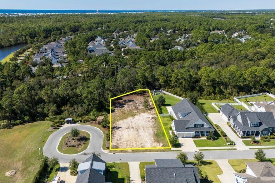 Amazing Opportunity in WaterSound Origins!Own one of the largest home sites in WaterSound Origins, offering exceptional privacy at the end of a quiet cul-de-sac and surrounded by a beautiful natural preserve. This nearly half-acre lot provides the perfect setting to build your custom dream home.Enjoy neighborhood amenities including a pool, fitness center, tennis and pickleball courts, plus access to Lake Powell and Origins Golf Course. Conveniently located near new shops and restaurants. Don't miss this incredible opportunity!