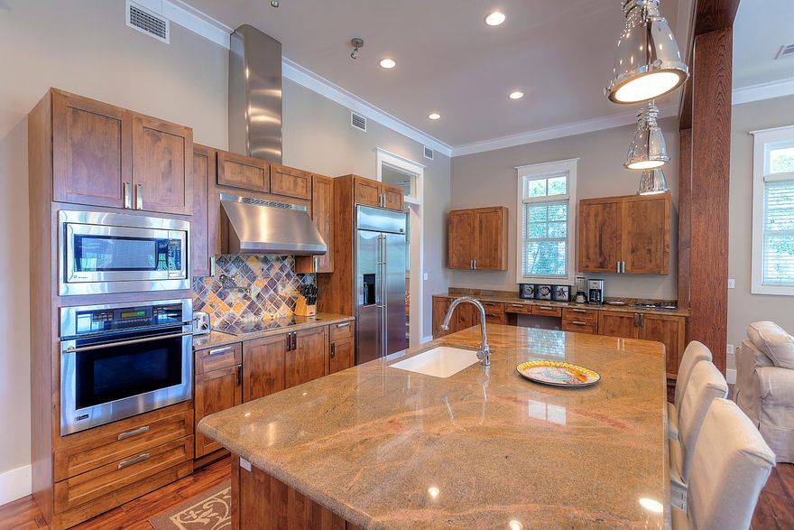 BRIGHT and SPACIOUS, fully-furnished oasis in the heart of WaterColor with 2,200 square feet of porches and outdoor living space, cozy outdoor fireplace, and green space galore! The floor plan is unbeatable, with 3,549 square feet and a dreamy-fully stocked kitchen any chef would appreciate. It's all in the details-a pot filler over the stove, wine cooler, and a sink conveniently placed in the middle of the marble kitchen island. The options are endless, with wood floors, high 12' ceilings, and porches attached to each bedroom. The second-floor Master suite is well appointed, with a walk-in closet and master bathroom. Your guests will thoroughly enjoy the spacious secondary rooms on the first and second floors, and the loft bedroom with private bathroom on the 3rd floor!