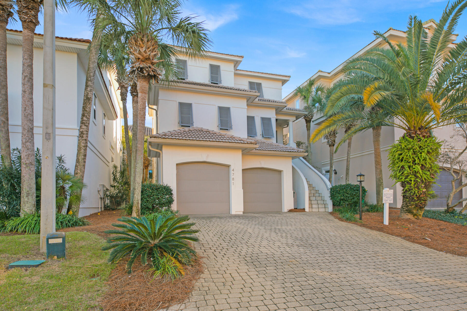 RENTAL PROJECTIONS OF OVER $200K.   Located in Exclusive Destiny By The Sea.   SOUTH OF SCENIC HWY 98.  Private pool.  Sleeps 15 in beds.  4bd 3.5bth.   Updated master bathroom with large separated shower and tub.  ELEVATOR serves all three stories.   Walk to the gulf.  Currently a vacation rental.  Peek-a-boo views the the Gulf of Mexico from 2nd and 3rd floors.  PRIVATE BEACH.   NEW GOLF CART, BIKES, PADDLE BOARDS all included with purchase.