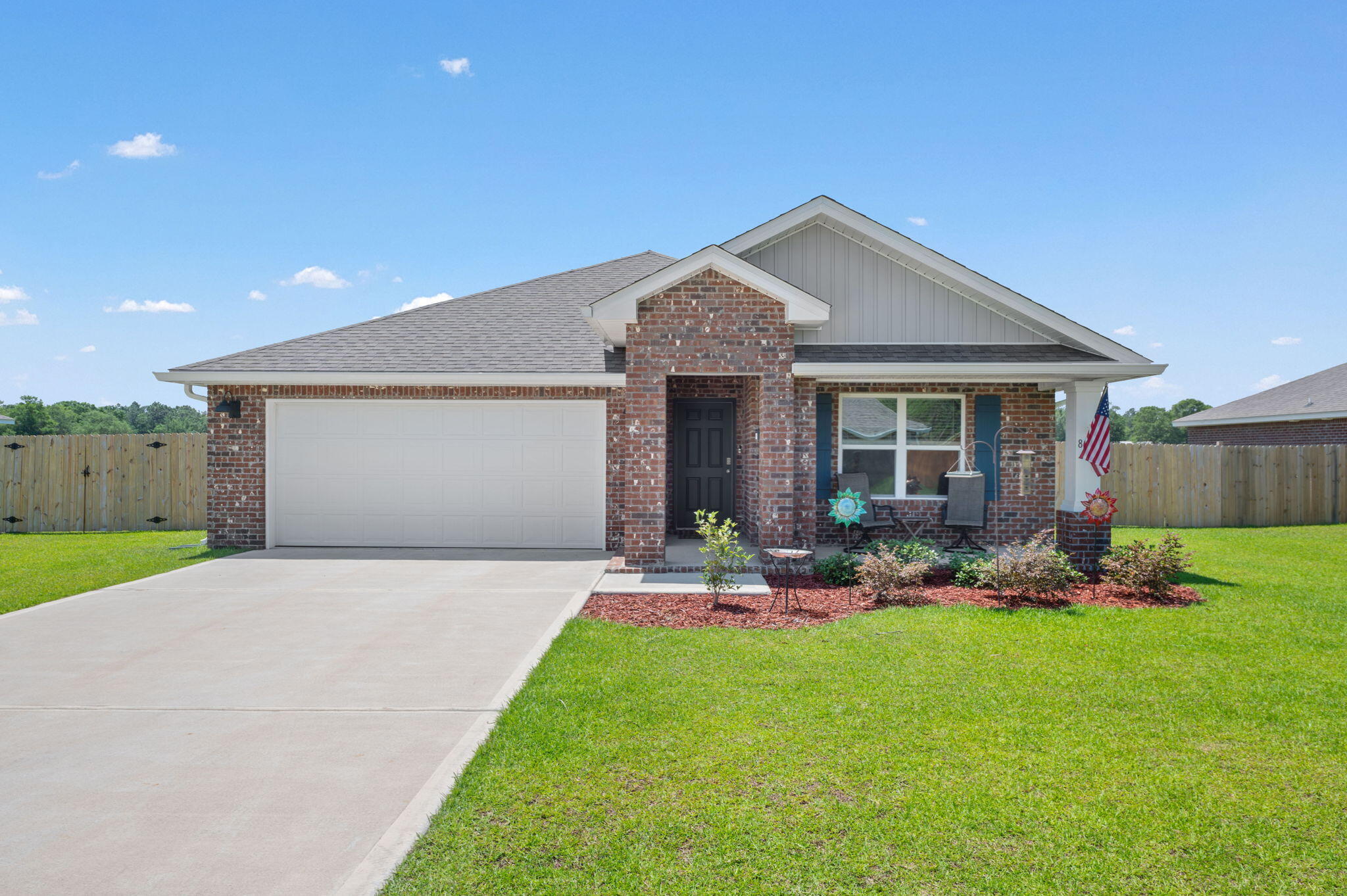 New desirable neighborhood PLANTATION WOODS right off of hwy 87. Less than 25 minutes to the beach without paying the beach prices! If you desire a lush landscape, fully fenced yard, with privacy in the backyard, then this is the home for you! This beautiful brick home features 4 bedrooms with a split floor plan. LVP flooring thorough with carpet in the bedrooms. This home is barely lived in so you get to take advantage of the appliances that convey, new blinds throughout, the previous lot with zero neighbors behind you, and a washer/ dryer. There is a double car garage with a slight elevation for wonderful drainage without standing water after it rains. The new septic system is located near the right side of the patio. Rockys Pest has the termite bond in place. COME VIEW TODAY!