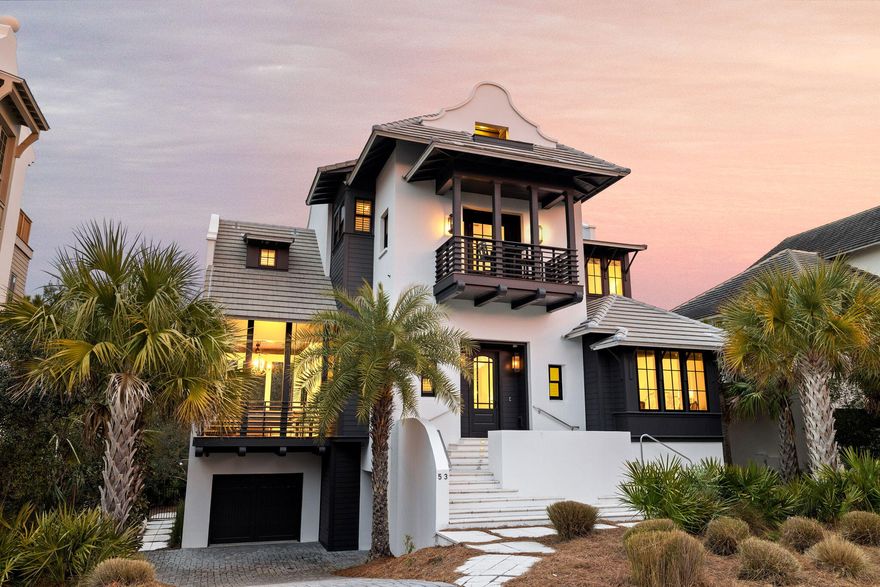 Welcome to 53 East Bermuda, an architectural masterpiece situated in the prestigious gated community of The Retreat in Blue Mountain Beach. Perfectly positioned amidst acres of protected conservation land, with serene views of Draper Lake and steps from 3,000 feet of private Gulf-front beach, this six-bedroom, six-and-a-half-bath coastal residence offers an unparalleled lifestyle in one of the most exclusive enclaves along 30A. Designed by Terra Nova Architecture and completed in 2018 by Construction, this home marries enduring craftsmanship with modern luxury, creating a seamless blend of sophistication and comfort.This property rises gracefully above its natural surroundings, its tropical-inspired architecture harmonizing with the tranquil forested setting. Thoughtfully designed to invite natural light and capture Gulf breezes, the residence spans four levels connected by a private elevator, offering over 5,000 square feet of meticulously curated indoor and outdoor living space. Every detail has been considered, from the block-and-frame construction to the fine finishes, ensuring a home that is both low-maintenance and timeless.

The main level serves as the social heart of the home, featuring an expansive open-concept design that effortlessly integrates living, dining, and culinary spaces. High ceilings and wide-plank, wire-brushed red oak flooring in a custom gray stain create a warm and inviting atmosphere, while large windows frame views of the lush surroundings. The gourmet kitchen is equipped with top-tier appliances, including a Wolf gas range, Sub-Zero refrigeration and wine storage, fine cabinetry, and a large island with seating for six. A walk-in pantry enhances functionality, while two adjoining porchesone designed for outdoor grilling and diningextend the living space into the outdoors. A powder room and an ensuite guest bedroom complete this thoughtfully designed level.

The second floor is home to the spacious primary suite, a sanctuary of calm with an adjoining sitting area that invites you to unwind while overlooking the surrounding conservation. The spa-inspired primary bath features a soaking tub, an oversized walk-in shower, and dual vanities, all crafted with a focus on timeless elegance. Two additional ensuite bedrooms, a conveniently located laundry room, and a light-filled sitting area with an adjoining porch complete this floor. Whether used as a reading nook or home office, the flexible space reflects the thoughtful design found throughout the home.

The ground floor provides exceptional versatility and is tailored for both relaxation and entertainment. A large recreation room with a kitchenette bar anchors the space, complemented by a game room, an additional ensuite bedroom, and a second laundry room. French doors lead to a covered porch and outdoor terrace, where a fenced area provides privacy and connection to the surrounding forest. This level offers an ideal setup for hosting guests or creating a retreat for multi-generational living.

The third floor is a delightfully designed space featuring a custom-built bunkroom capable of sleeping up to 11 guests. A private balcony with Gulf views offers a reminder of the home's proximity to the water, providing a scenic backdrop for unwinding after a day of sun and sand. This level exemplifies the home's focus on creating memorable experiences for friends and family alike.

Located within The Retreat, this home offers more than just exceptional livingit provides access to a lifestyle defined by natural beauty and exclusivity. Spanning 90 acres, including 40 acres of preserved nature, The Retreat is a highly sought-after community featuring private beach access, an exclusive Gulf-front Beach Club, and a serene boardwalk along Draper Lake for kayaking, paddle boarding, or simply enjoying the peaceful surroundings. With a private beach chair setup on uncrowded sands and miles of trails to explore, residents enjoy a harmonious blend of privacy and adventure.

53 East Bermuda presents a rare opportunity to own a legacy property in one of 30A's most coveted neighborhoods. Schedule your private tour today and experience the pinnacle of coastal living in The Retreat.