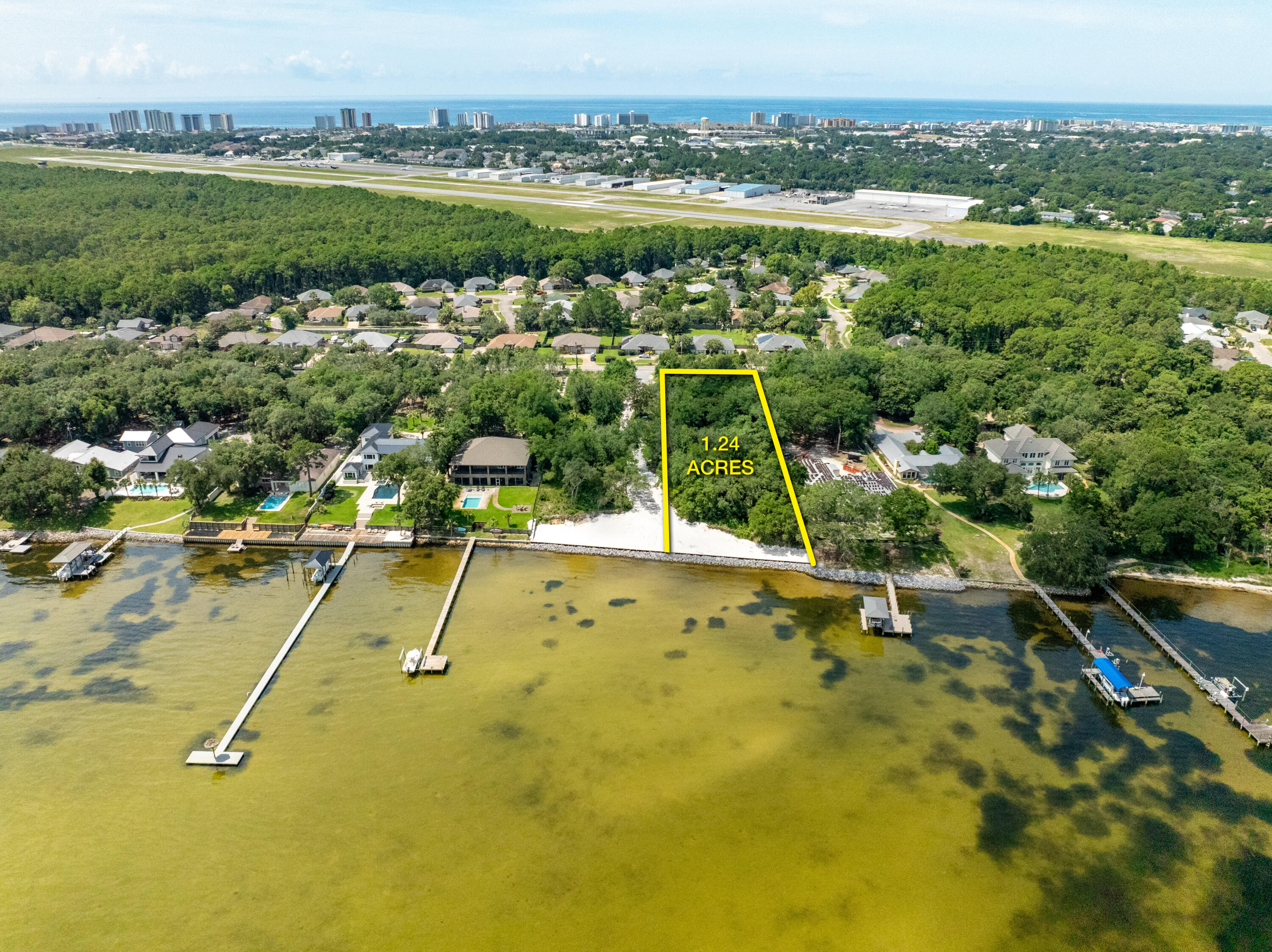 ~1.24 PRIME ACRES on the Bay! One of the most impressive, vacant water-front lots now offered for sale on Indian Trail in Destin, Florida, encompassing an extraordinary view corridor and vista across the scenic Choctawhatchee Bay. Very few premier, vacant waterfront lots remain in Destin for the custom design and construction of fabulous new homes, especially one of this magnificent scale, with no HOA, and the assemblage opportunity with the eastern adjacent parcel! This rare opportunity yields a substantial expanse of 116' fronting the bay, with boundary depths of 508' and 493', west and east boundaries, respectively. The adjacent ~1.26 acre parcel is separately listed at MLS 953256. an amazing family compound totaling 2.5 acres at an unquestionable value! Please inquire for further details, and to schedule your private showing.