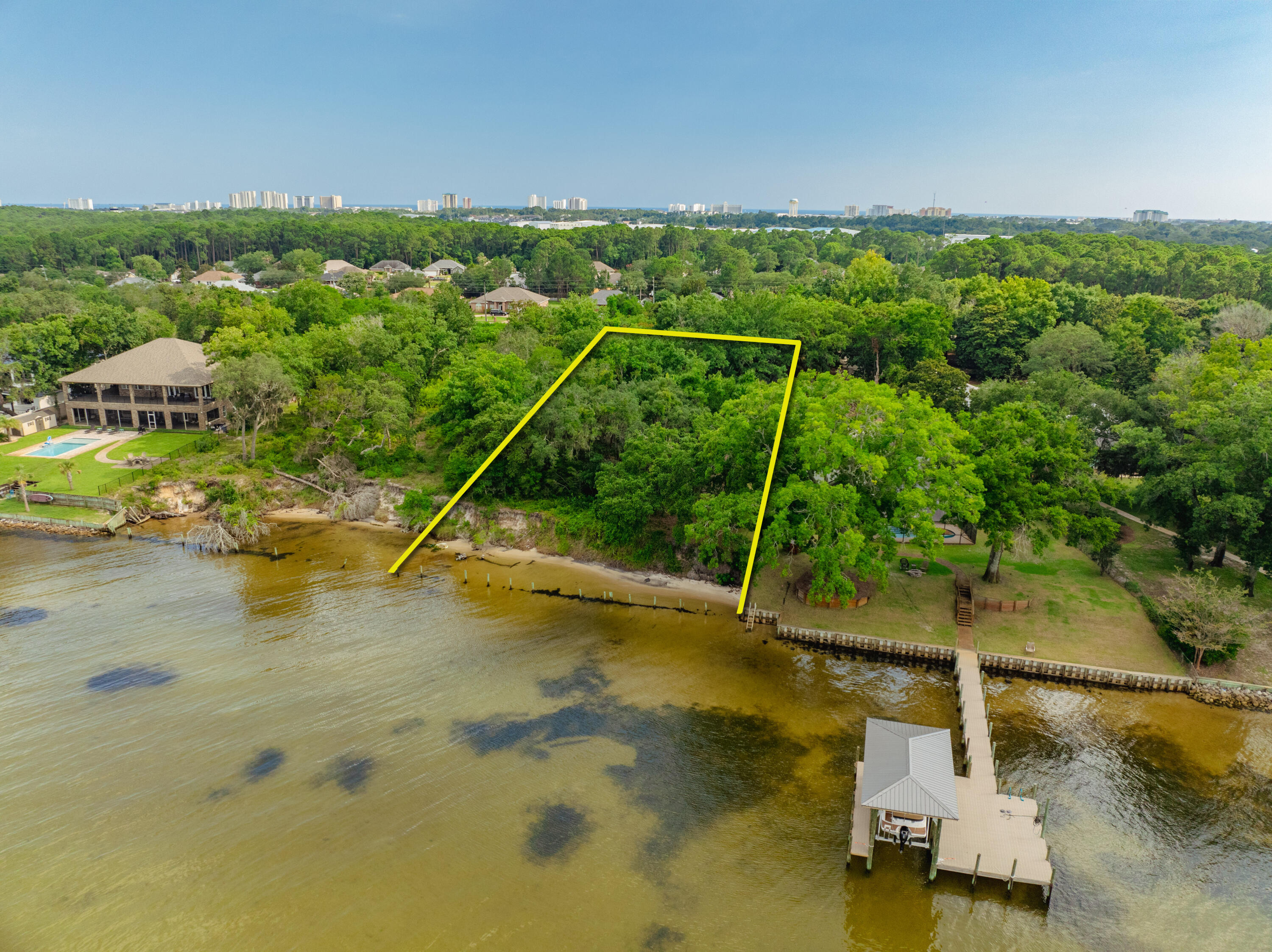 ~1.24 PRIME ACRES on the Bay! One of the most impressive, vacant water-front lots now offered for sale on Indian Trail in Destin, Florida, encompassing an extraordinary view corridor and vista across the scenic Choctawhatchee Bay. Very few premier, vacant waterfront lots remain in Destin for the custom design and construction of fabulous new homes, especially one of this magnificent scale, with no HOA, and the assemblage opportunity with the eastern adjacent parcel! This rare opportunity yields a substantial expanse of 116' fronting the bay, with boundary depths of 508' and 493', west and east boundaries, respectively. The adjacent ~1.26 acre parcel is separately listed at MLS 953256. an amazing family compound totaling 2.5 acres at an unquestionable value! Please inquire for further details, and to schedule your private showing.