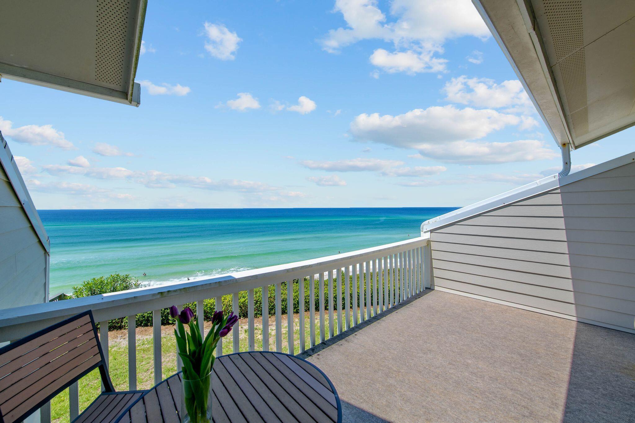 Aptly coined 'Seascape from Reality,' this stunning and immaculately maintained coastal Gulf-front retreat is nestled within Seacrest Beach along 30A. The bright and airy unit is flooded with natural light and showcases stunning Gulf-views throughout. A gourmet kitchen encompasses custom cabinetry, a breakfast bar, pantry and a luxury appliance suite. The main living area offers an open floor concert paired with gorgeous wood-styled porcelain tile flooring and a terrace perfect for admiring the new palate of mesmerizing hues emitted by the renowned Emerald Coast sunsets each and every night. Synonymous with relaxation, the sumptuous main suite boasts breathtaking views, a seating area, and private balcony. A junior suite is also found on the second floor.