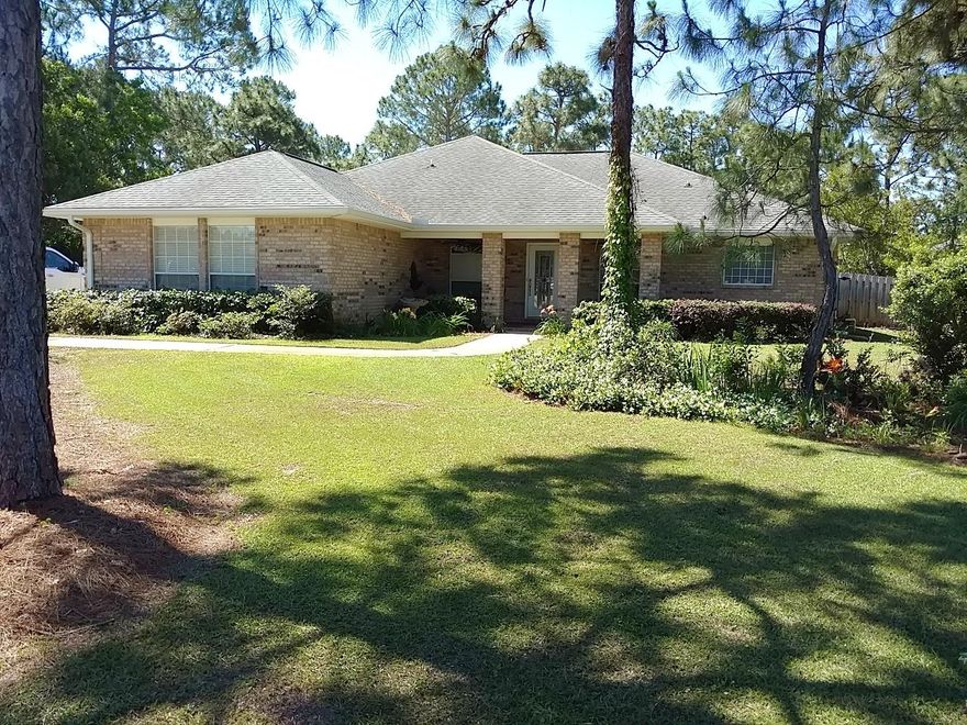 Here is a great opportunity to purchase a fantastic home in beautiful Driftwood Estates. This all brick home features 3 bedrooms, 2 baths, great room with fireplace, study, separate dining room, situated on a huge .52 acre lot with totally fenced back yard & 2 car garage. Living room has a vaulted ceiling, the spacious kitchen has brand new Dallas White granite counters and back splash & new stainless sink, guest bedrooms just completed in Oak Savano flooring by Kaindl, and balance of home floored in beautiful diagonal tile, Fanimation Ceiling fans throughout, roof gutters just installed, new stainless appliances, and a recent 390 sq ft Florida room out back with brick paver floors & continuous windows for your outdoor viewing pleasure. Also landscaping and new sod just completed in the rear of home and along Driftwood. And brand a new Heat Pump system and new dryer in August also. Almost $20,000 in upgrades spent on this home in the last month! This home is turn key and ready for the new owner. Driftwood Estates is a great family neighborhood convenient to shopping, restaurants, Sacred Heart Hospital and the bay..as well as Grand Boulevard, Silver Sands Outlet Mall and nearby  Village of Baytowne Wharf for shopping and dining. Call and schedule your viewing today. Prospective buyers or their Agents should confirm all information to their satisfaction.