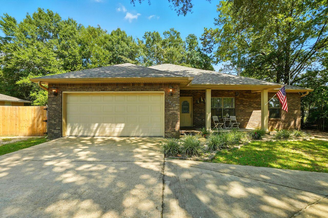 2.85% VA Assumable Interest Rate available to qualifying buyers! This impeccably maintained, all-brick 3 bedroom, 2 bathroom contemporary home is truly move-in ready. Step inside to a spacious open-concept layout featuring a large family room, kitchen with a smart design, and dining area that all flow seamlessly--perfect for entertaining or cozy family nights. Fresh neutral paint and included washer & dryer make settling in a breeze. Outside, the low-maintenance backyard is enhanced with white rock landscaping, plus a park-like grilling station the seller is leaving for the new owner to enjoy. With no HOA and easy upkeep, this home is ideal for today's busy family!Shed was purchased since 2022 and conveys at no value.