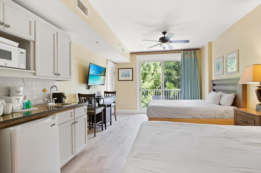 Take in the serene and tranquil nature views facing south with a glimpse of the Choctawhatchee Bay from the private balcony. Wood look tile flooring throughout offers easy care and maintenance. This condo is fully furnished with two queen beds, kitchenette with refrigerator, microwave and coffee maker and a full bathroom. Lasata owners enjoy exclusive access to the private Solstice Club with outdoor grilling area and indoor entertaining area, resort style pool, hot tub, and kiddie pool, as well as the fitness center.