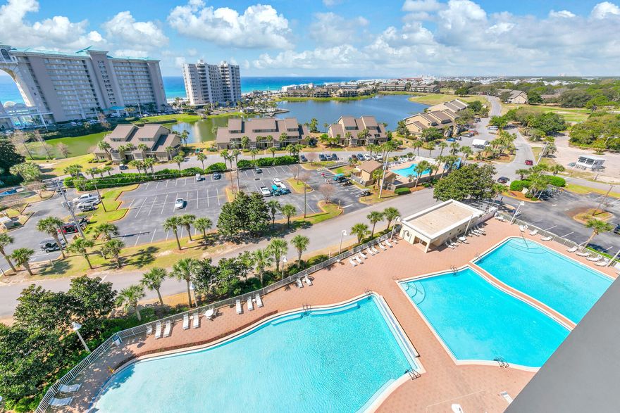 Nestled within a prestigious gated beach community and boasting over 2,000 feet of pristine private shoreline, this stunning two-bedroom condo offers unparalleled luxury living. Elevated to capture panoramic vistas, the unit provides sweeping views of the Gulf of Mexico to the south, Lake Stewart to the east, and the serene Choctawhatchee Bay to the north. The spacious, open-concept design seamlessly flows into a breathtaking 24' x 14' balcony that spans the entire width of the residence, accessible from both the main living area and the master suite. The gourmet kitchen features elegant granite countertops, custom raised-panel cabinetry, and a grand kitchen view that elegantly shines through! The master bedroom is thoughtfully positioned to highlight the incredible southern views. More.. The master bedroom offers direct access to the balcony for an unparalleled indoor-outdoor living experience. This residence is the epitome of coastal sophistication and tranquility.
The expansive master bath exudes luxury with both a sumptuous garden tub and a separate, sleekly designed shower, providing the ultimate in convenience and relaxation. Perched on the 10th floor, Unit 1003 offers a guest bedroom that enjoys breathtaking views of the serene Choctawhatchee Bay, creating a tranquil escape.

Ariel Dunes, nestled within the exclusive, guard-gated Seascape community, occupies an enviable position between Scenic Gulf Drive and Highway 98, ensuring effortless access to both. With the recent expansion of the Seascape Towne Centre, Unit 1003 now enjoys unparalleled proximity to world-class dining, family-friendly entertainment, and upscale boutique shopping.

Seascape offers an array of exceptional amenities, including an 18-hole championship golf course that gracefully meanders around peaceful lakes, five-star tennis courts with premier instructional programs, two resort-style pools totaling approximately 12,000 square feet, and 2,000 feet of pristine, private beach access. The community also boasts a wealth of additional exclusive offerings. Association dues cover groundskeeping, water, trash, sewer, cable, internet + so much more. 