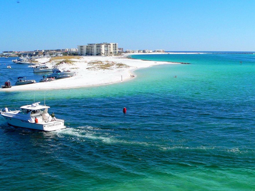 Beautiful condo with views of the Harbor and Gulf. This unit will make a great rental or wonderful Home. Offers 2 Bedroom and 2 full baths plus a bonus bunk room. The Emerald Grande is a short walk  to all the activities that the Harbor has to offer.Restaurants,  Deepsea fishing Charters, Shops and festivals.Full service Spa, Sauna, Steam room, Fitness Center, Pools, Room service, Hot Tub, Room Service, Front desk ,ETC...Private boat shuttle to a beach with beach chairs and umbrellas.