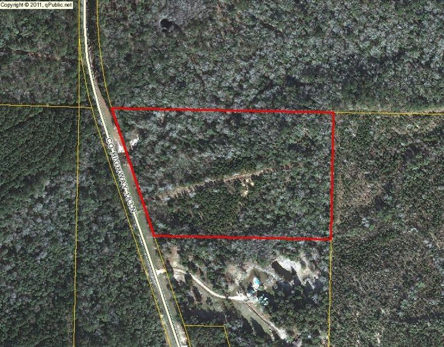 One of the most beautiful home sites in Walton County. The property has a large creek running down one side and is covered in large hardwoods. There is a well and 2 septic tanks on the property. Come build your dream home here, only minutes outside of Historic Defuniak Springs. Possible Owner Financing available