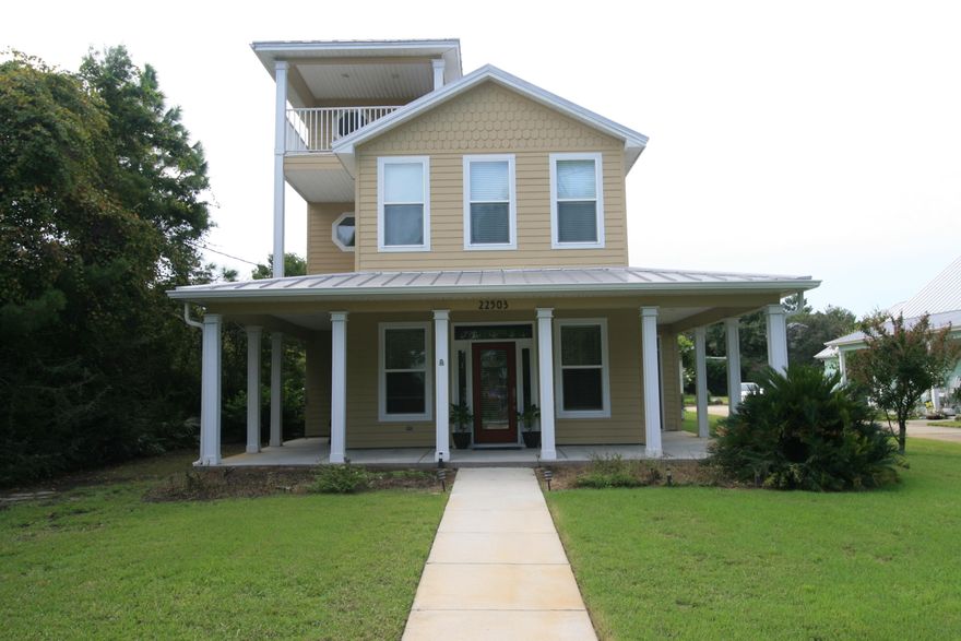 Gorgeous, Like New Home, On The West End Of PCB And Across The Street From Lake Powell!! A Very Quite Area That Has The Best Of Both Worlds! 2764 Sq. Ft. On A Huge Corner Lot! Downstairs Master Suite! A Jetted Tub And Separate Tiled Shower. 4 Bedrooms, 3 Baths, Detached 2 Car Garage. Plenty Of Outdoor Porches And Entertaining Spaces! Kitchen Is Beautiful With Granite Countertops And Top Of The Line Stainless Appliances. Breakfast Bar. Standing Seam Metal Roof. Hardy Board Siding. 4th Bedroom Is Currently Being Used As An Office. 3rd Floor Large Covered Balcony With Great Views Of Lake Powell!! Landscaped Yard With Separate Well And Irrigation System. Concrete Driveways And Parking Areas. Outdoor Shower. Close To The Beach, Lake Powell, Pier Park and Hwy 30A! Please Verify Dimensions.