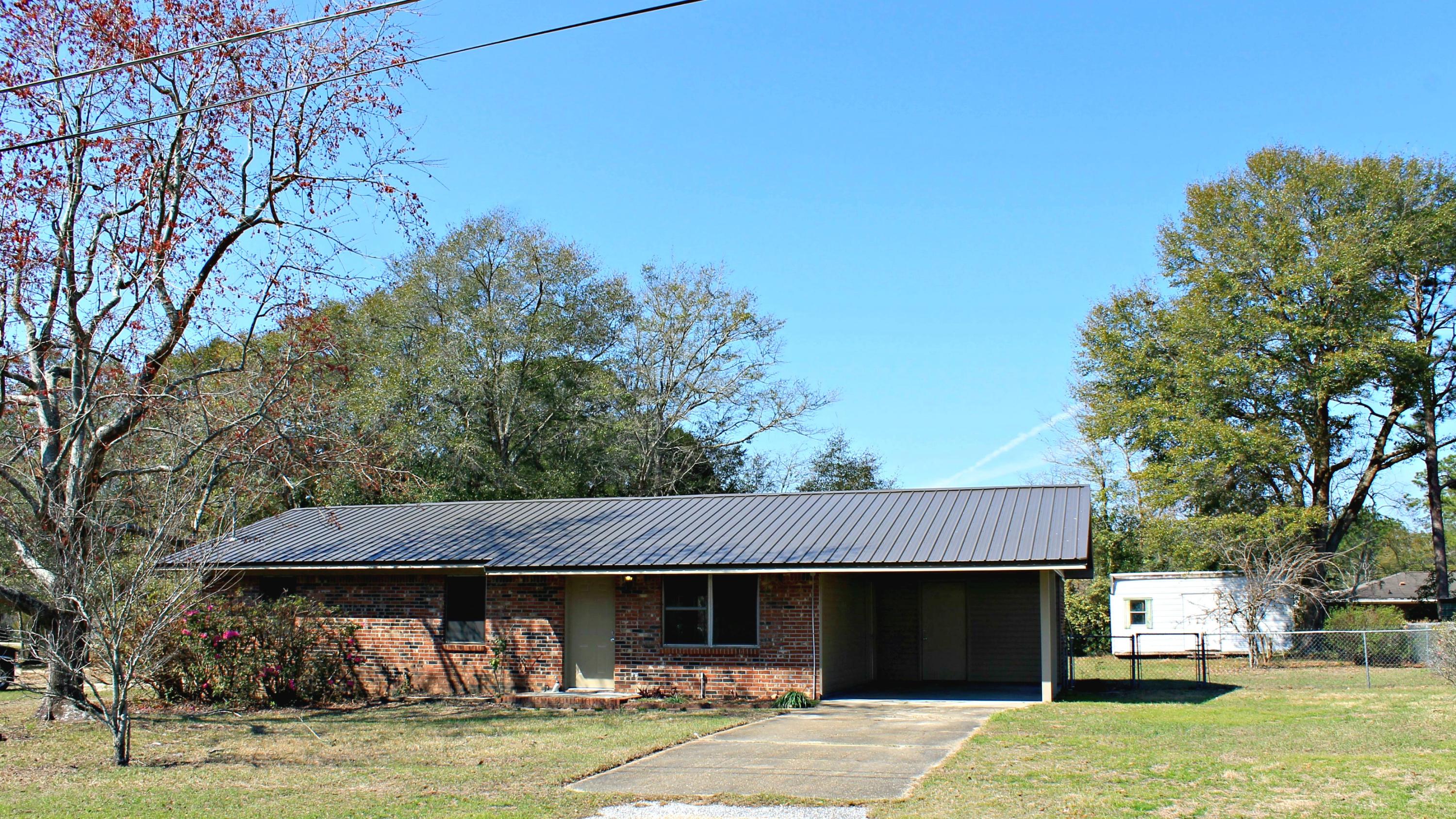 Completely remodeled and updated brick home in DeFuniak Springs City limits. This home is very close to schools, Wee Care Park and shopping. Large, fenced back yard with 2 storage sheds. Some of the updates include, new metal roof, New Hvac, new paint, new flooring, new covered back deck and much more. Seller will also be adding a refrigerator. All measurements must be verified by buyer.
