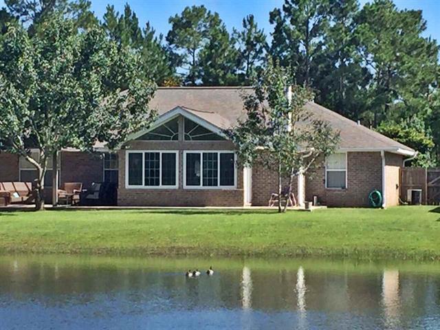 Located just far enough away for tranquility, this 4 bedroom 2 bathroom home has had new LVP and baseboards installed throughout. There are large windows allowing plenty of natural light in.   The addition of the sunroom makes for a great way to view the lake on a nice evening.