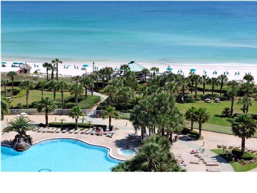 Awesome corner penthouse located on the west side of St. Lucia. Enter through the foyer which opens to an expansive living/dining/kitchen area. The soaring ceiling heights and wall of windows creates a WOW factor with spectacular views in almost every direction. Also on the main level are 3 bedrooms and 3 baths. Walk up the lovely staircase into a huge master suite and master bath that you must see to believe. Also located upstairs is a bunk room for the kids. Travertine flooring in the living area and granite countertops in the kitchen and baths. Access one of 3 large terraces from every single room. Single car garage and climate controlled storage included. St. Lucia is the newest building at Silver Shells with a beautiful lobby, private pool, hot tub and grill area. The Silver