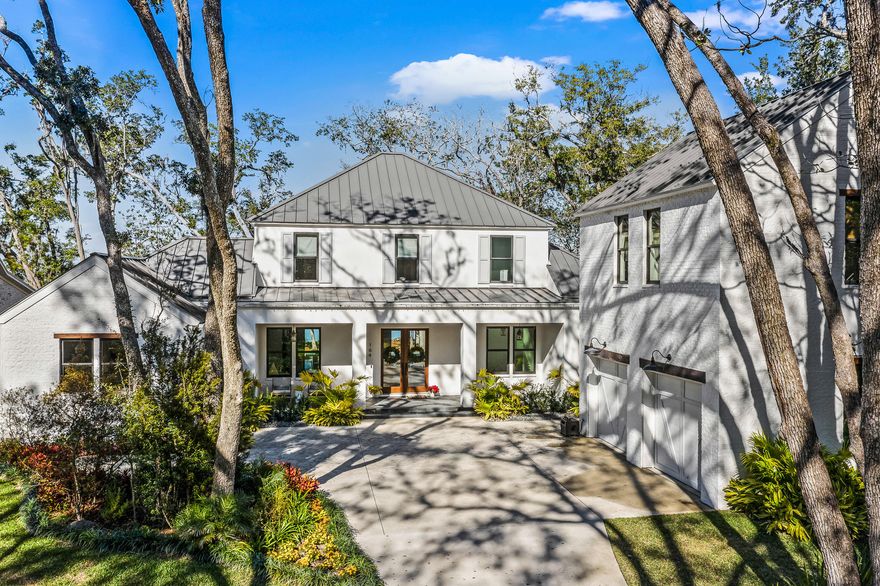 Enjoy all that bay-front living has to offer from this beautifully constructed home in Point Washington. The Woods neighborhood offers a peaceful escape with world class boating all just minutes from the beaches that have made 30A famous. The gorgeously landscaped .7 acre property is the perfect place to call home. Upon entering you are greeted with expansive bay views through the open living area complete with a fireplace. The first floor has direct access to the large pool (with an electric pool cover for kids and pets) and backyard area. The spacious kitchen with quartzite countertops and a Wolf gas range leads to a screened in porch with an outdoor grill and sink. White oak floors can be found throughout the home. You will also find a butler's pantry, half bath, and laundry room behind