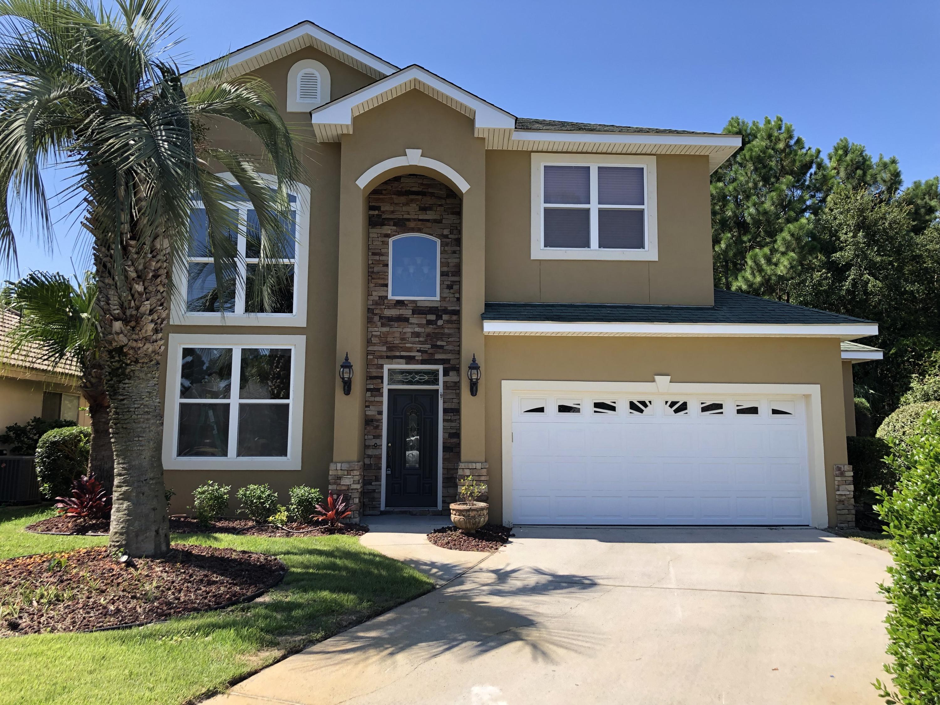 This is a custom built Mediterranean style home with too many details to list. Chef's kitchen!! 20 Ft ceiling in the dining and foyer. This is a must see in person property! New carpet, tankless water system. Located in the heart of Miramar Beach featuring 3 bedrooms, 2.5 baths and loft style office, first floor master suite, separate shower and jetted tub. Kitchen features 3 ovens, gas/elec stove,custom built cabinets. 2nd floor features 2 bedrooms with jack and jill bath central vacuum/ 2 hvac units, audio throughout. First floor family room is inviting with gas fireplace, 10 foot ceilings and 8 foot doors. Irrigation system. The community has a pool, tennis court and a dock on the bay!