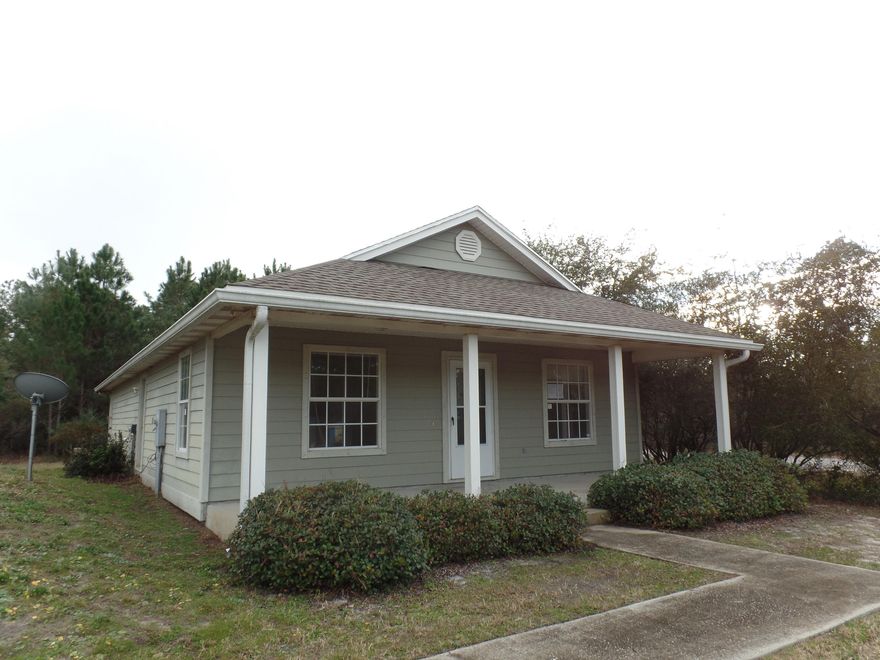 REO - List price is $154,900. A great place to call home! Lovely 3 bedroom 2 bath Florida cottage on a spacious corner lot in the Bayou Farms community. Enjoy the open living & dining areas, the spacious kitchen with big breakfast bar, 2 covered porches, big yard and so much more that this property has to offer. This home is in a great location just North of Hwy 98 near shopping, restaurants, beaches, schools and more. Come see this great home today!!