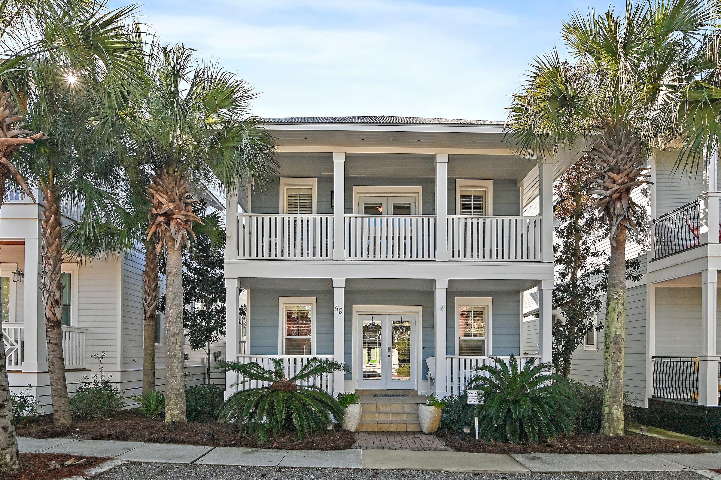 Welcome to your dream coastal retreat in the heart of Seacrest Beach, perfectly situated between Rosemary Beach and Alys Beach along the iconic 30A corridor. This stunning home has been fully renovated and professionally designed for modern luxury living, featuring a brand-new kitchen with quartz countertops, a white-and-gold hexagon tile backsplash, and gold-tone accents on the farmhouse sink and hardware. The open-concept great room, adorned with stylish furnishings, modern lighting, and luxurious coastal decor, offers the perfect space for entertaining or relaxing. Freshly painted inside and out, the home also boasts all-new flooring, updated bathrooms, and thoughtfully curated details throughout. The main level features a generously sized guest suite, offering convenient single-level living. Head up the newly finished stairs to the second floor, where you'll find the serene primary suite with a king bed, cozy sitting area, and spa-like ensuite bathroom complete with a soaking tub, walk-in shower, double quartz vanities, and a makeup station. Upstairs, a guest bedroom and playful bunk room share a refreshed Jack-and-Jill bathroom, while the massive (24 ft) balcony provides a tranquil spot to unwind and enjoy the lively surroundings. The exterior is equally impressive with covered porches on both levels, a rare covered carport, and a private rear terrace perfect for grilling, bike storage, or relaxing on a shaded swing. Seacrest Beach residents enjoy world-class amenities, including a 12,000-square-foot resort-style pool, scenic walking trails, community parks, and a tram service to a private stretch of white sandy beach. Offered fully furnished and ready for immediate enjoyment, this property is ideal as a primary residence, vacation home, or income-generating rental. Don't miss this incredible opportunity to own this beautifully designed and perfectly located coastal retreat.