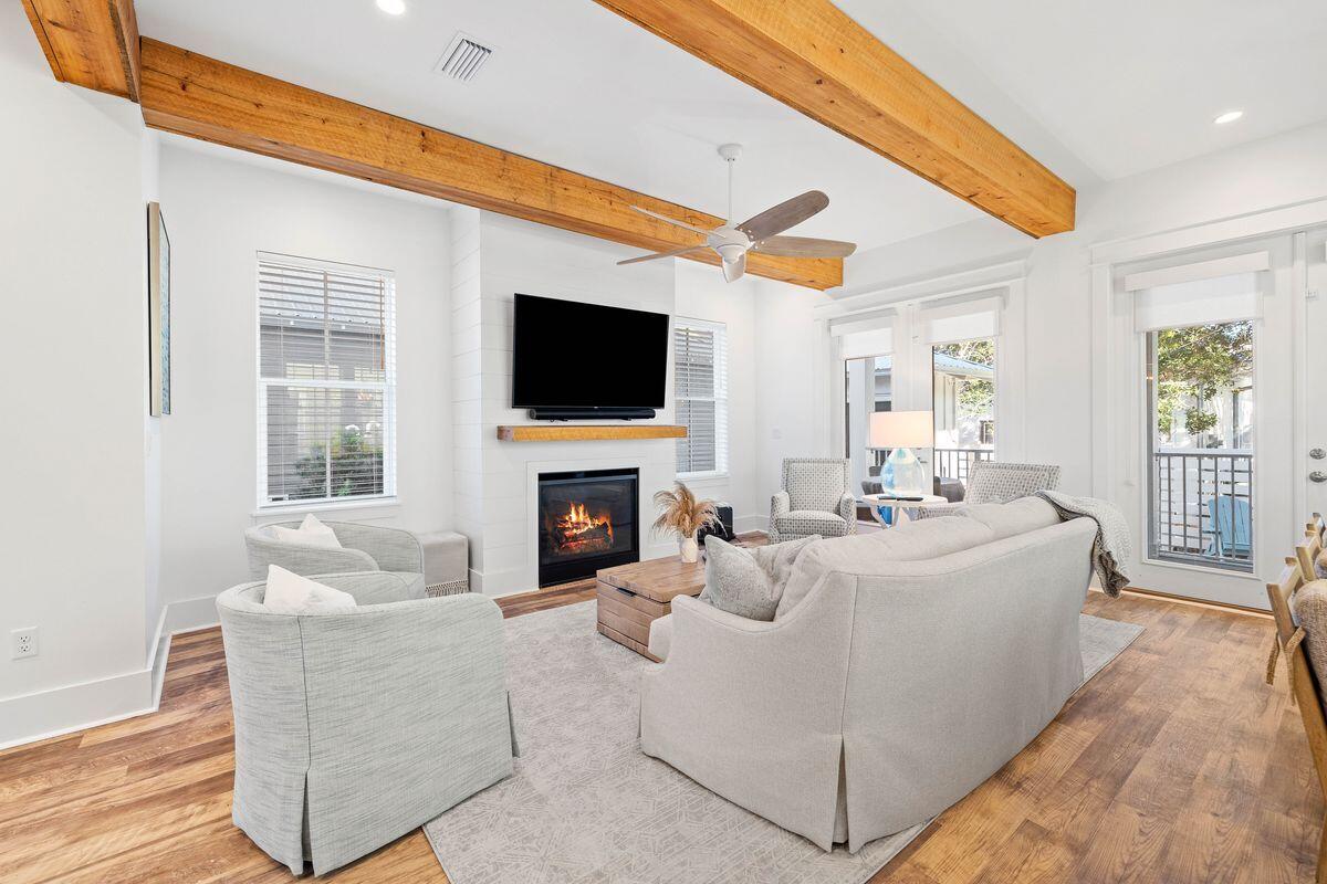 Space and light are all-important at this fully furnished, almost brand new home in Seacrest Beach. Five beds, two sitting rooms, a swanky outdoor kitchen and a rare private pool make this a most desirable residence for those looking for a luxurious coastal lifestyle. Private balconies on all three levels provide quiet space for relaxing or starting the day gently with a cup of coffee. Designed to accommodate larger families and guests, the open floor plan effortlessly blends style with practicality. No area demonstrates this better than the gourmet kitchen, equipped with quartz counters and top-of-the-line Viking appliances for rustling up home-cooked favorites or celebratory menus. The long white breakfast bar will be the social hub for pre-dinner drinks while delicious aromas emanate