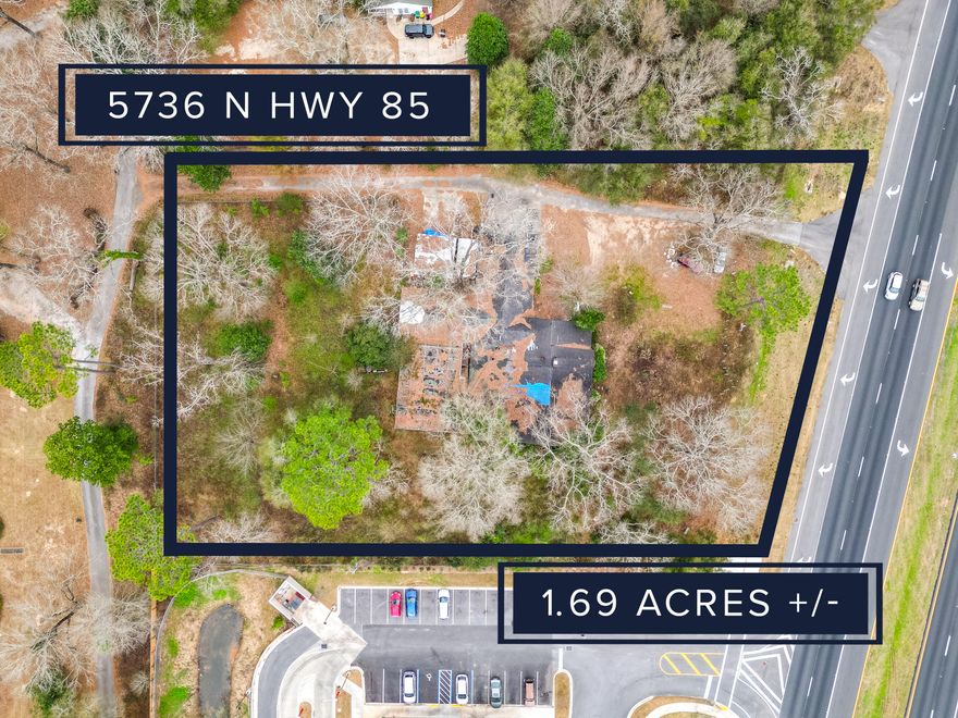 Rapidly growing Crestview! This 1.69 AC property is an excellent location for your business. It's zoned C3, which means you have endless possibilities for development. Additionally, it boasts 230 ft of frontage on Hwy 85, providing easy access to the highway. Your business will receive a lot of traffic with the new Circle K & Burger King right next door. House on property is distressed and is given no value. Other businesses located nearby are Winn Dixie, Wendy's, Publix, Davidson Middle School and Crestview High School along with the US Post Office, just to name a few.