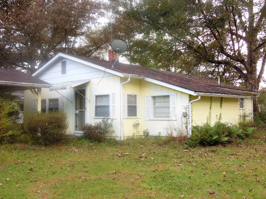 Affordable home with 2 bedrooms, 1 bath, that has additional living space that you possibly could convert to a 3rd bedroom. This property is ocated in a small community just 5 miles south of Florala, AL. in the Gaskin community. Home is in a well maintained condition. Just right for a starter size home or retirement size home. Has a attached 2 car carport and a detached garage with workshop area. Well and septic with lots of flowers and trees.