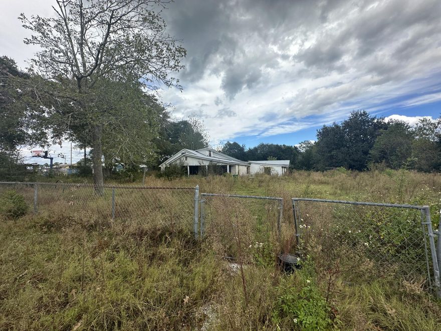 **Price Reduction** Great Opportunity!! Fixer Upper! Metal Roof! Two Story 4Bed/2Bath Approximate 2400 sqft heated/cooled with a metal roof. Zoned as Mixed use  property and located in the middle of town with Lots of new growth and just a short drive from local schools, hospital, south Publix, a variety of restaurants, and the upcoming Crestview Commons, Hwy 85 and I-10 are in close proximity to the property.