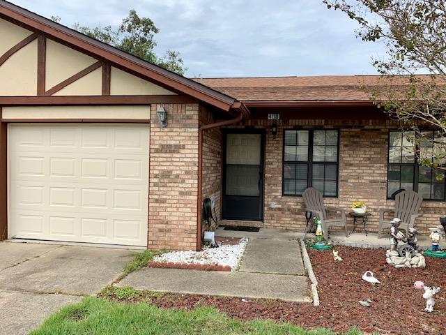 NO stairs, NO carpet and it has a GARAGE! Tile throughout this 2B/1.5B patio home with one-car garage. Roof replaced in 2014, and HVAC replaced in 2011. Master bedroom has walk-in closet and convenient storage closet on back deck. New back deck, and Seller to repaint the interior. Buyer may choose interior color. Survey available. Unit is being sold ''as is''. Washer/dryer remain but convey ''as is''. Has been a rental since 2009 but well-maintained by tenants. Buyer to verify dimensions, square footage and all pertinent information.