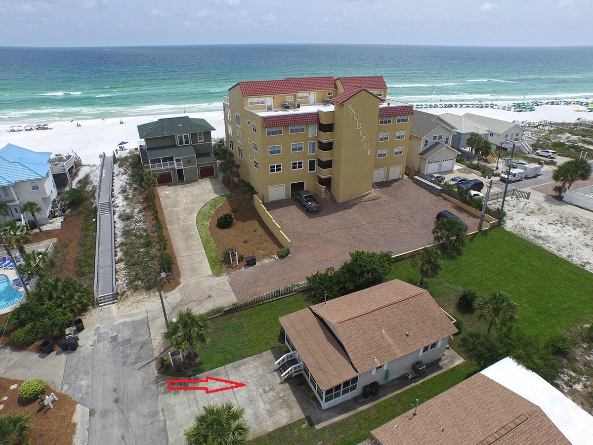 A rare opportunity to purchase the last sizable lot in Miramar Beach that's only 30 feet from it's beach access, this property has substantial potential including unobstructed beach views and gross rental income of up to $300K. As an added bonus, a 720 square foot cottage that is currently undergoing extensive renovations will convey with the sale. Exterior improvements on the existing home include a new metal roof, a new screened in front porch, Hardie board siding, new doors, and new vinyl windows. Interior renovations consist of new plumbing, insulated foam in the attic and under the house, new flooring, new kitchen cabinets and granite counter tops, new vanities, new marble shower with rainfall shower head/diverter, new sheet-rock, new solid wood doors with crystal Emtek hardware,