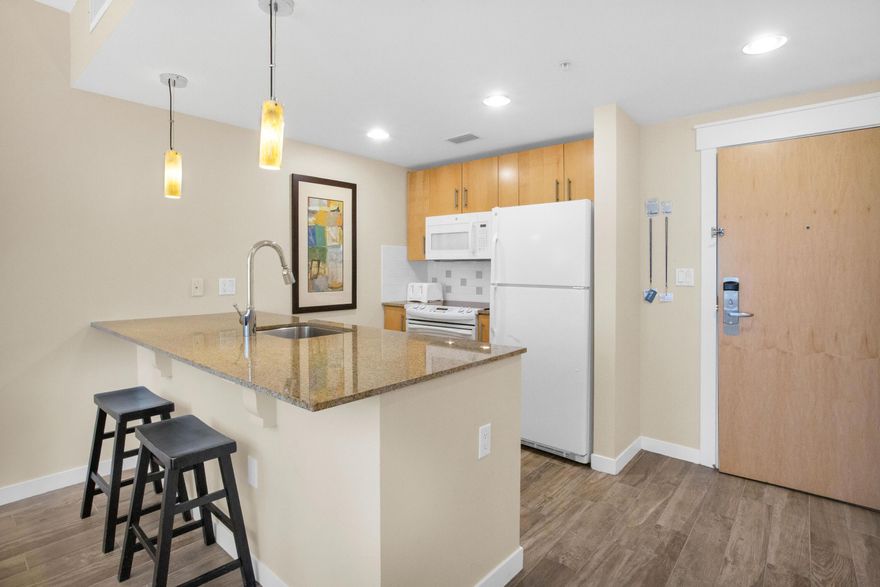 Bright and beautiful vacation retreat located on the 4th floor of Elation. Take in the lovely view of the Grand Garden from the private balcony and enjoy the convenience of being close to restaurants, shopping, and entertainment in the Village of Baytowne Wharf. With a strong rental history, this condo is not only perfectly priced, but also makes for an excellent investment opportunity. Interior features include wood-like tile flooring throughout the open living/kitchen/dining space, double vanities in the master bathroom, granite countertops, and a washer/dryer.