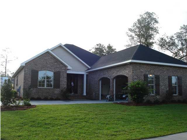 This lovely brick and Hardie Siding home has 8' interior doors, granite countertops, wood cabinets, wood flooring throughout, stainless steel appliances, recessed lighting, wired for surround sound, full landscaping with irrigation system, and much more! This development is conveniently located in the heart of Niceville with easy access to Eglin Air Force Base, Duke Field, and the beaches of Destin. Come see for yourself; you will not be disappointed!