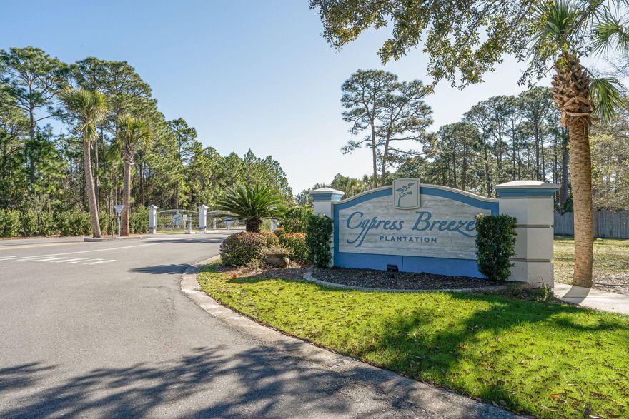 Beautiful lot nestled in the cul-de-sac and backing to the preserve in Cypress Breeze Plantation. This gated community boasts a magnificent 3-tiered lagoon-style pool with waterfalls and recently completed a $200,000+ renovation.A generous conservation area in Cypress Breeze is devoted to Florida's natural wildlife and flora. There are no build-out time requirements or required builders. Shopping, dining, entertainment and the beach access of Ed Walline Park are just 3/4 mile down the direct walking/bike path.