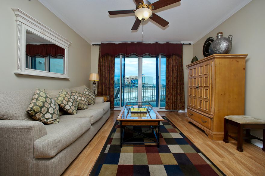 Fully Furnished vacation rental machine with $45,000 gross rental income. This 2nd floor condo is at pool level and close to the children's pool, BBQ grills, and parking garage NO STAIRS OR ELEVATOR and renters love this feature. This condo has a Bonus Bunk area and the 2 bedrooms and living room with floor to ceiling glass doors access onto the large 8' deep balcony. Kitchen has granite countertops, breakfast bar and stainless steel appliances. Both bedrooms have flat screen TV's and bathrooms have a separate shower and garden tub.