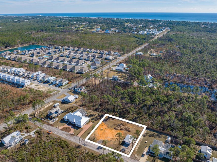 Build your dream home at the beach on this cleared half-acre homesite in Thompson Plantation, a 17-home community south of Highway 98. This property currently hosts a 600-sq.-ft. garage with power. This is a superb opportunity with no HOA and no build-out time requirements in a quiet neighborhood with no through traffic. Enjoy close proximity to the beach and all of the amenities Scenic Highway 30A is known for, just 1.5 miles away.