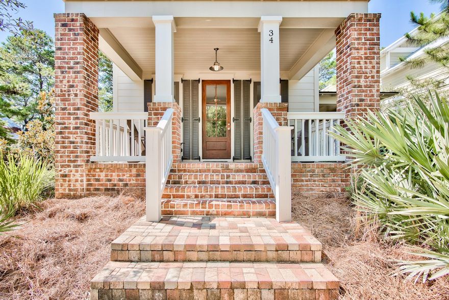 Another beautiful home in the coveted Forest Lakes community at a hard to come by price. This 3 bedroom beach retreat is just within the gate and within easy reach to 30A amenities, restaurants and the Gulfview Heights Public Beach Access. Built in 2014, with a clean modern white kitchen and bright white bathrooms, this home offers convenience, classic brick porch columns, and attractive covered outdoor living off all bedrooms and front entry. Large screened porch off master suite and second carport entry. Access to pool, lake and trails; moments away. This West 30A community boasts a two-tiered pool with summer kitchen and fireplace, walking trails, a gorgeous green space, water vistas, access to state forest, a playground, stocked lake, basketball goal, all in a picturesque gated hamlet.