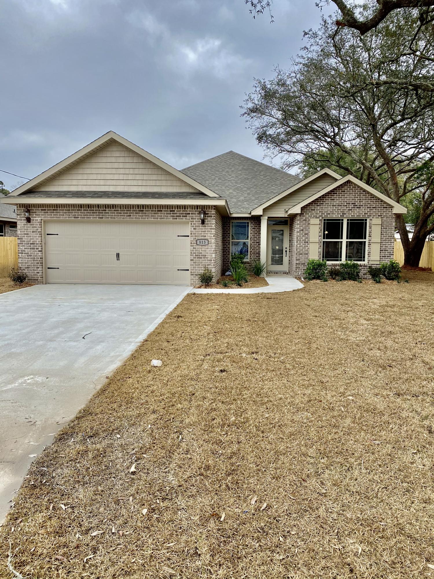 Welcome home to this beautiful Brand New 4 bedroom 2 bath home centrally located minutes from the white sandy beaches, air force bases, shopping and restaurants. As you walk into this beautiful home you will love the spacious living room. Beautiful kitchen cabinetry and a large bar area with granite countertops, and a spacious walk in pantry. Separate dining room area for many family gatherings. Master bedroom has a tray ceiling with crown molding. Master bath has double vanities, beautiful garden tub with an separate shower. If your looking for a beautiful huge back yard this is the house for you. Make this beautiful home yours today. Buyer to verify all areas of importance including , but not limited to lot size, room dimensions, zoning, etc.