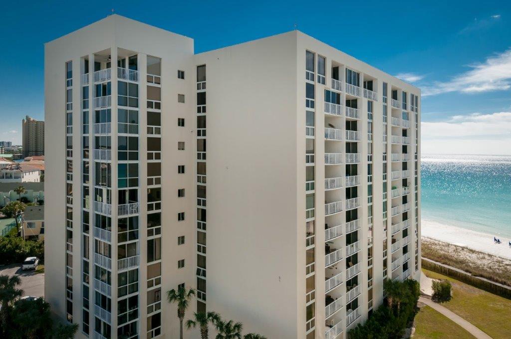 The only 3 bedroom Shoreline Towers condo on the market. Tastefully done renovated and spacious 3 BR 2 BA in Building II. Unit comes fully furnished. Living/Dining Room, Kitchen, Hall and Bath's all tiles with bedrooms carpeted. Kitchen is updated open design with granite counter tops, stainless Steel appliances, and smooth ceilings throughout. Can view beach from balcony off of living room and other bedrooms. Shoreline Towers is a gated community complex with 24 hr patrol. Large Club room with full kitchen, fitness center and sauna. Tennis, heated pool, shuffleboard, picnic area with grills near lake and handicap accessible walkover to white sandy beaches. Owner boat and RV parking.