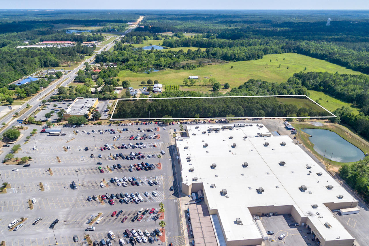 This Prime 5+ Acre Commercial Parcel is located within the City Limits of DeFuniak Springs, Florida. Subject parcel is zoned Commercial, located adjacent to Wal-Mart, capturing broad visibility from Highway 331. A cross easement allows for favorable Ingress/egress. For added value, the site shares existing storm water retention located on the back portion of the subject parcel. Please inquire for further details.