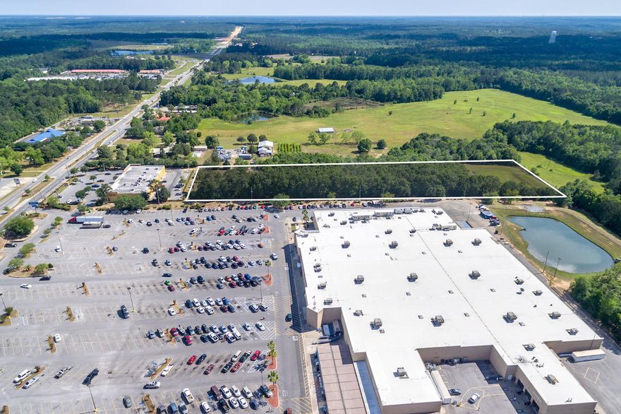 This Prime 5+ Acre Commercial Parcel is located within the City Limits of DeFuniak Springs, Florida. Subject parcel is zoned Commercial, located adjacent to Wal-Mart, capturing broad visibility from Highway 331. A cross easement allows for favorable Ingress/egress. For added value, the site shares existing storm water retention located on the back portion of the subject parcel. Please inquire for further details.