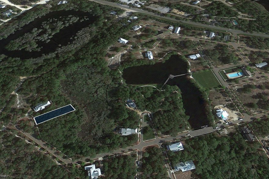 This lot situated near the very end of Okeechobee West in Forest Lakes overlooks serene neighborhood marshland from its rear. Across the street is state forestland. This combination of factors creates an especially private setting for your future home. Forest Lakes has no build out time requirement so you may build at your leisure. Forest Lakes is an outstanding option for those who dream of living along Scenic Highway 30A in a planned community with architectural integrity and amenities. Its poolside pavilion features space for dining, a summer kitchen, as well as an outdoor fireplace. Beyond the pool is a manicured lakefront park and pedestrian bridge over the neighborhood lake. Brick paved streets add to the charming Southern atmosphere.