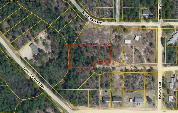 3 lots totaling about an acre with a nice stream at the back. Great location in fast growing Mossy Head area. Nice lakefront park in area. New elementary school, golf course and industry. Beaches less than an hour away.