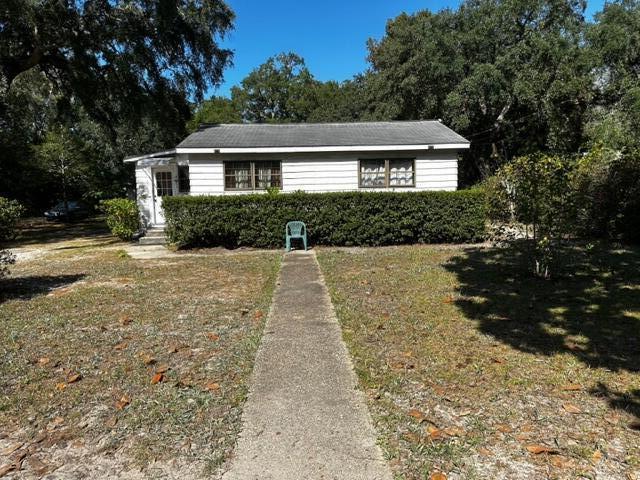 Calling all builders or investors! The sky is the limit with this rare opportunity to own 2 large lots combined with beautiful views of Choctawhatchee bay! Approximately .68 acres perfectly located on the corner of Live Oak Street in this quaint and popular community of Choctaw Beach! There is a single-story home that sits on one side of the lot that is in much need of repair or tear down. There is also an oversized 2 car garage or possible workshop to the left/back of the home. A chain link fence surrounds the entire parameter of the property. You will find some beautiful trees like Mimosa or Walnut trees that compliment this amazing location. Minutes away from Destin and the beautiful beaches of the Emerald Coast! Close to shopping and dining!