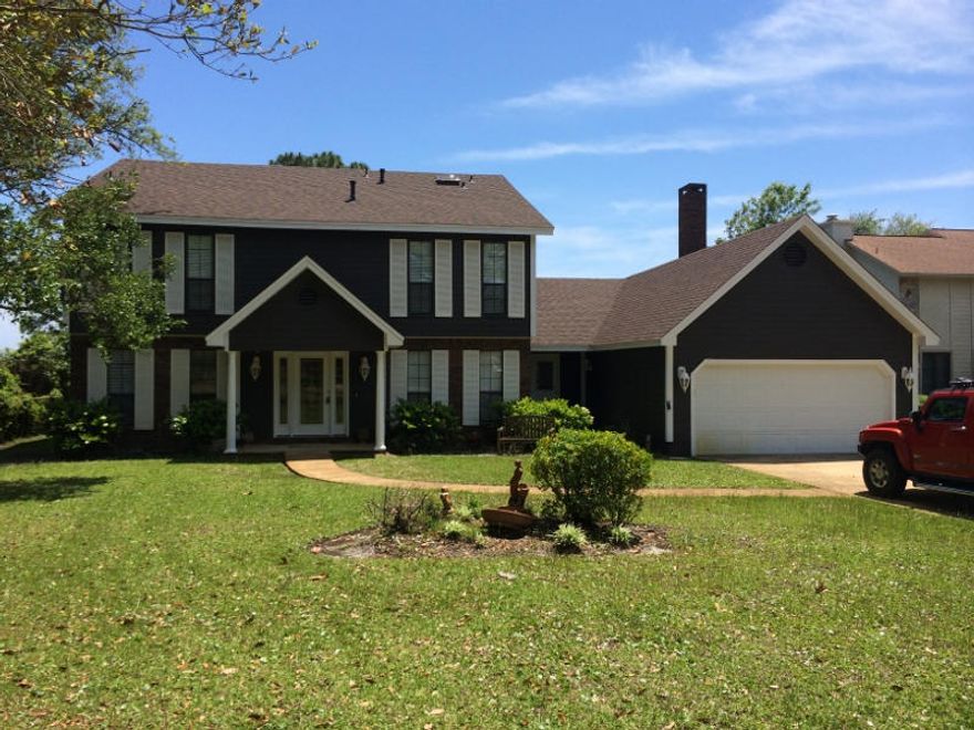 Nearly a 1,000 square feet of covered porch overlooking Santa Rosa Sound (inter coastal waterway)87 feet waterfront with retention wall and ladder to the water which is shallow enough to enjoy. This 3 Bedroom with one down and two up all are connected to their own baths. Large eat in kitchen with upgraded gas stove. you have views of the water from Family room, kitchen Master Bedroom and Master Bath, all leading out to the covered porches. New roof 2014, repainted inside and out. This home is ready for the new owner. The owner of the company has interest in this property.